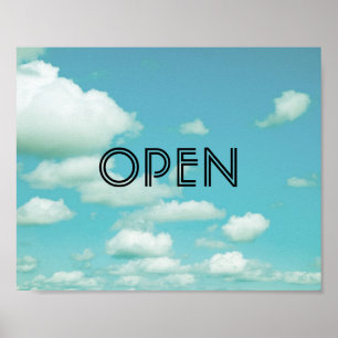 öppna tecken poster på blå himmel-fotografik