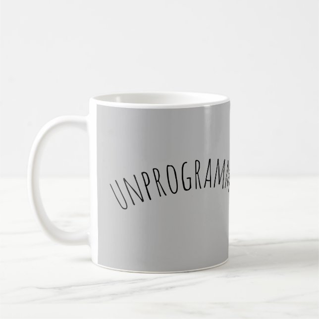 oprogrammerad (Quaker) med person Kaffemugg (Vänster)