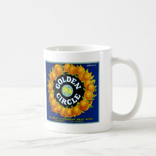 Orangar i gyllene cirkel kaffemugg