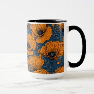 Orangar på mörk blått mugg