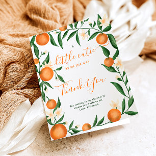 Orange av botaniska citrusfrukter med liten rosa tack kort