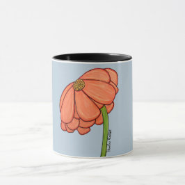 Orange blomma med blå bakgrund mugg
