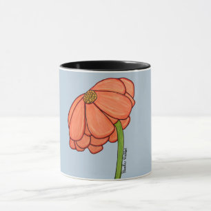 Orange blomma med blå bakgrund mugg