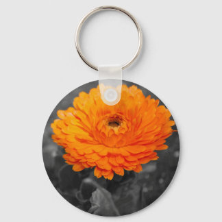 Orange blomma nyckelring