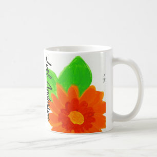 Orange blomma vid den Joel andersson Kaffemugg
