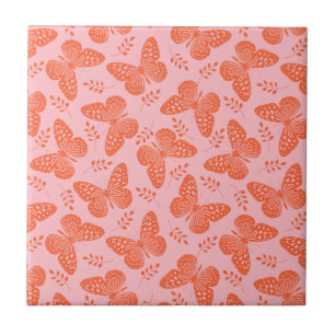 Orange butterfly mönster på rosa bakgrund kakelplatta
