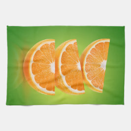 Orange delarare på grönt kökshandduk