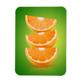 Orange delarare på grönt magnet