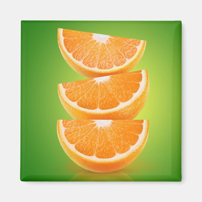 Orange delarare på grönt magnet (Framsidan)