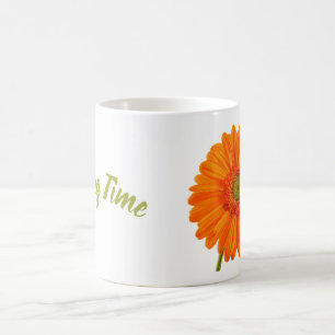 Orange gerbera-blommans vårbild med text kaffemugg