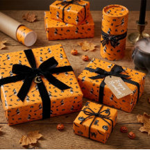 Orange Halloween-presentpapper med häxor