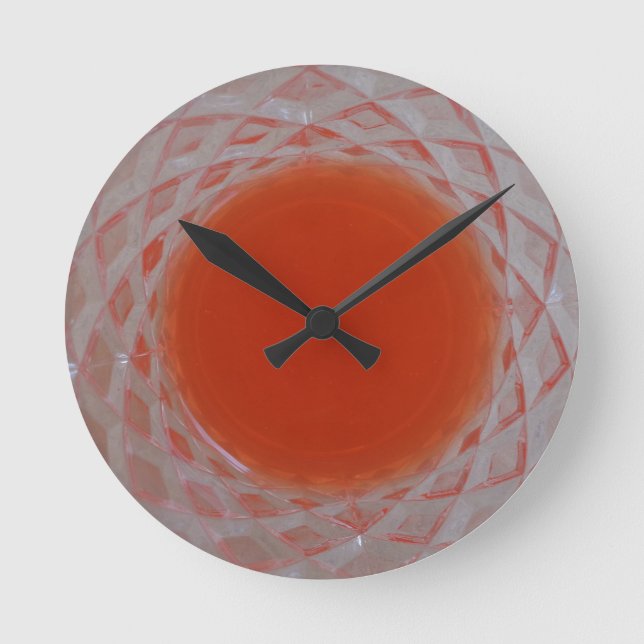 Orange i ett kristallglas rund klocka (Framsida)