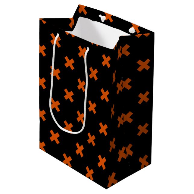 Orange kor sytlar på svart (Framsidan Vinklad)