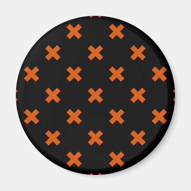 Orange kor sytlar på svart magnet (Framsidan)