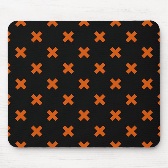 Orange kor sytlar på svart musmatta (Framsidan)