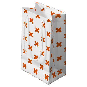 Orange kor sytlar på vitt