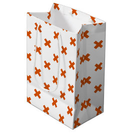 Orange kor sytlar på vitt