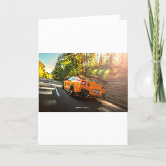 Orange Nissan GTsom river sönder till och med Kort