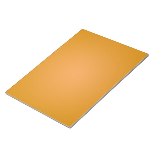 Orange notebook omslag med en slät textur anteckningsblock (Vinklad)