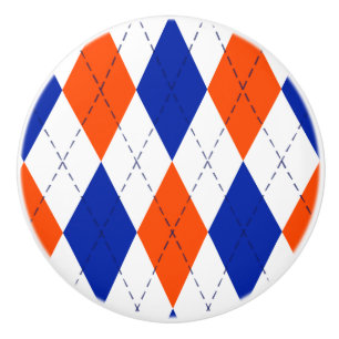 Orange och blå romb-argyle knopp