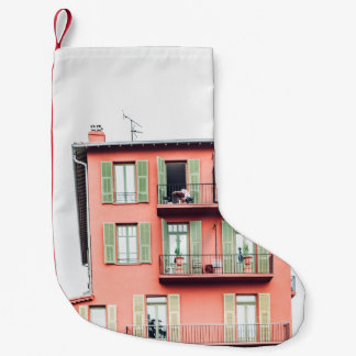 ORANGE OCH GRÖNT 4-STORY-BYGGNAD LITEN JULSTRUMPA