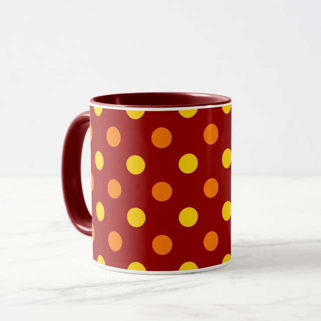Orange och gula prickar på röd mugg (Framsida vänster)