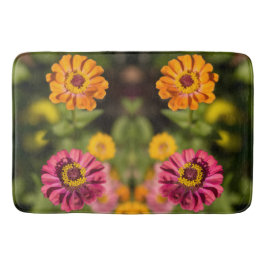 Orange och rosa av zink i blommar badrumsmatta