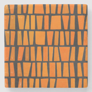 Orange och svarta afrikanska stammen mönster stenunderlägg