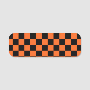 Orange- och svartvitt namnbricka