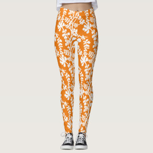 Orange och vit Blommigt som repeterar Mönster Leggings
