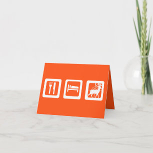 Orange och vit föda i viloläge kort