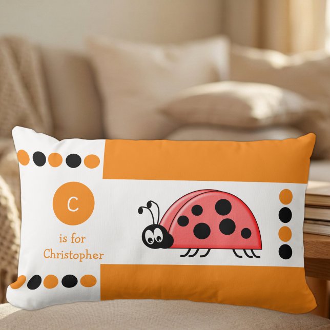 Orange och vit nyckelpiga monogram lumbarkudde (Skapare uppladdad)