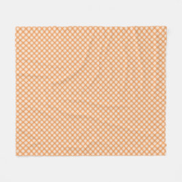orange och vit rutig mönster fleecefilt