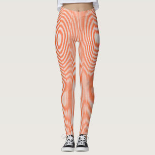 orange och vita stripe- och krackade baljväxter leggings