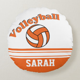 Orange- och vitvolleyboll personifierar rund kudde
