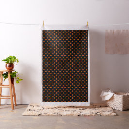 Orange polka kor på svart tyg