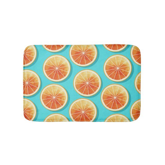 Orange segment på blå badrumsmatta (Framsidan)