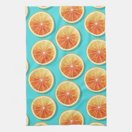 Orange segment på blå kökshandduk