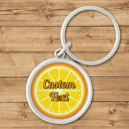 Orange segment rund silverfärgad nyckelring