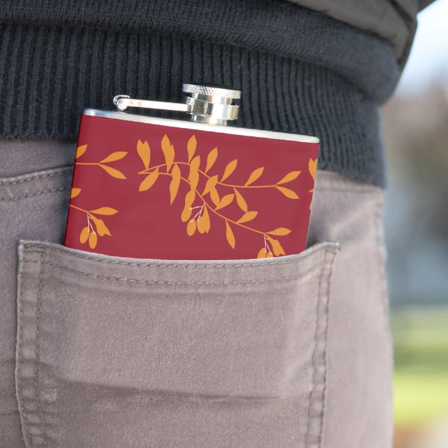 Orange silhouette gren löv på rött fickplunta (In Situ)