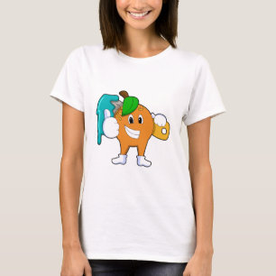 Orange som målarfärg med färgpensel t shirt