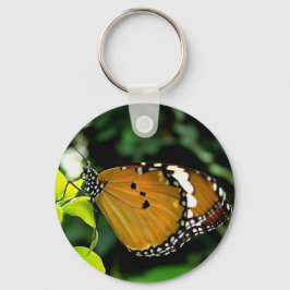 Orange, svart och vit fjäril på Löv Nyckelring