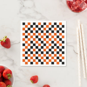 Orange svart och vit rutig pappersservett