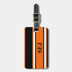 Orange, svarta och vita tjocka och tunna ränder bagagebricka