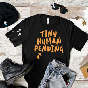 Orange T-Shirt för humant gravid-fingeravtryck