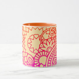 Orangefärgade lila blommor och mjuk persikofärgad mugg