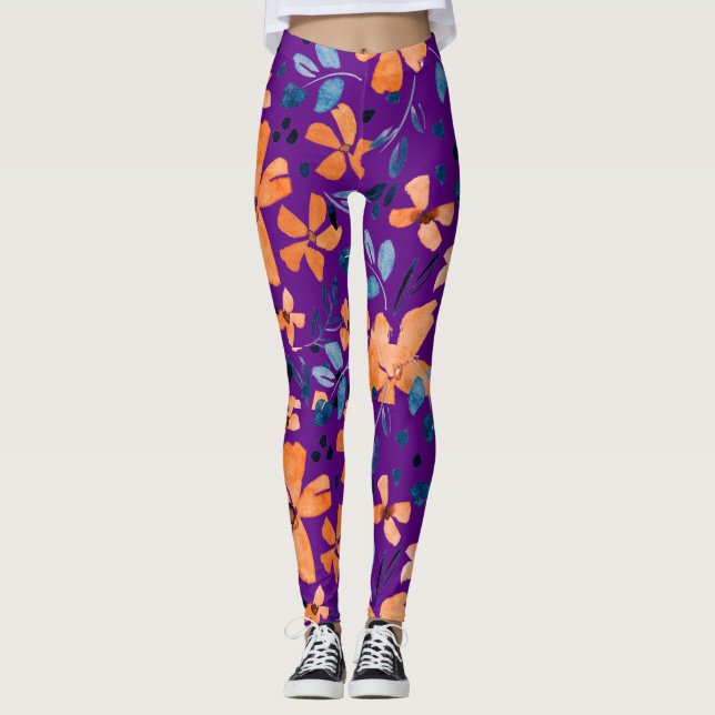 Orangens blomma och blå löv på genomskinlig leggings (Framsida)