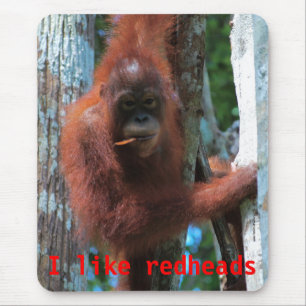 Orangutans gillar jag rödhårig musmatta
