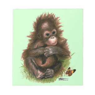 Orangutansbaby och fjäril anteckningsblock