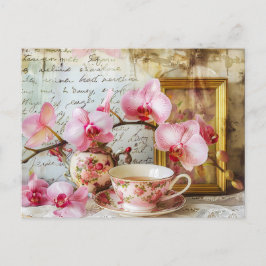 Orchids alongside a teacup and picture frame vykort